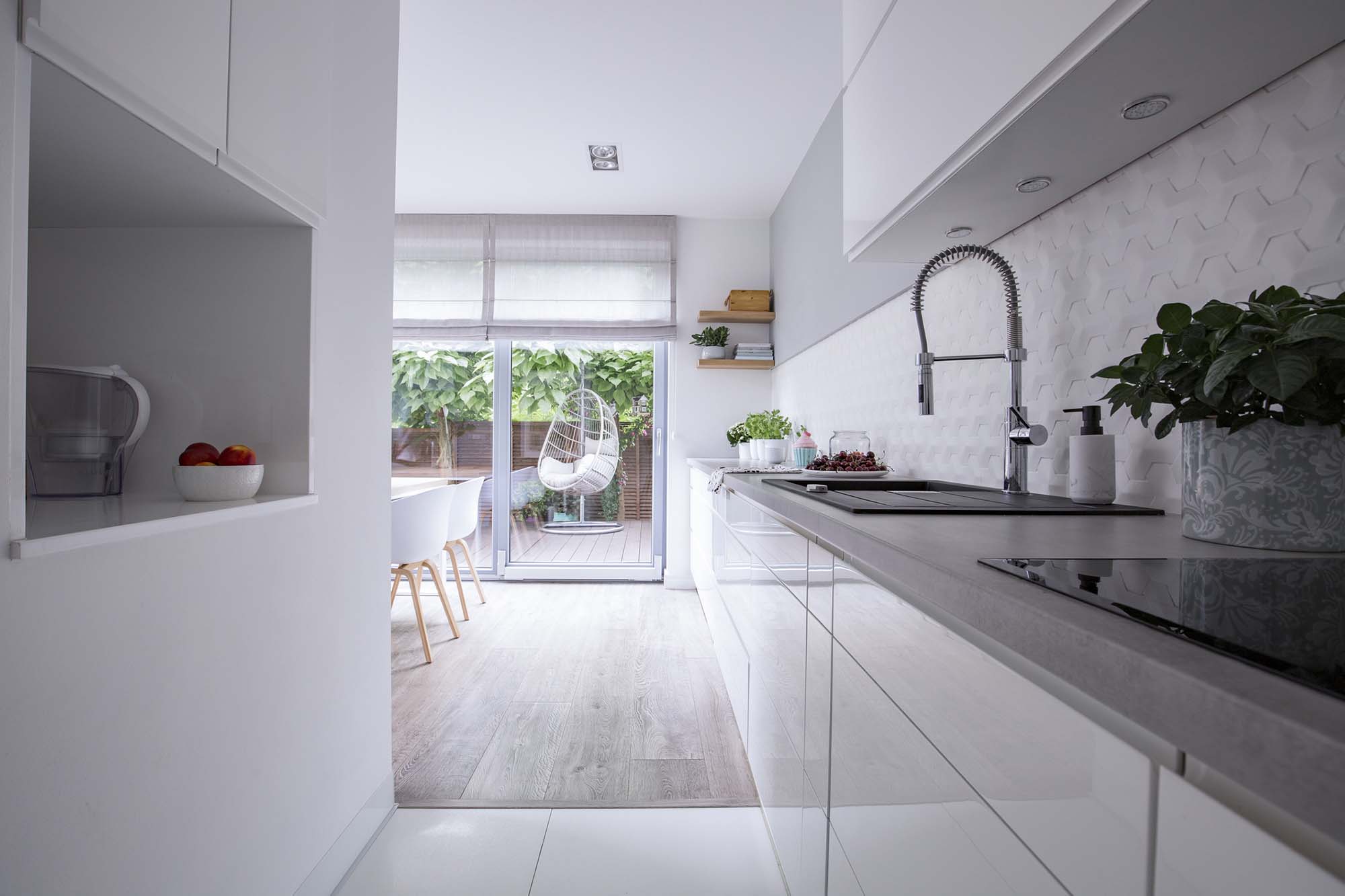 Modern white kitchen and dining room